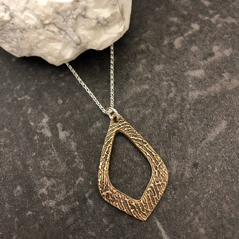 Open Teardrop with Fingerprint in Bronze