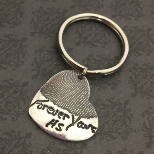 Handwriting layered over Fingerprint Keychains