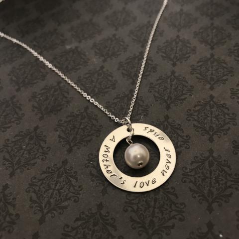 A Mother’s Love Never Ends washer necklace